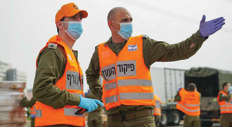 קציני פיקוד העורף במהלך הקורונה. "חובה לעשות כל מה שנדרש כדי לשמר את המוכנות והכוננות ליום פקודה. זה מה שעשינו" (צילום: דו"ץ)